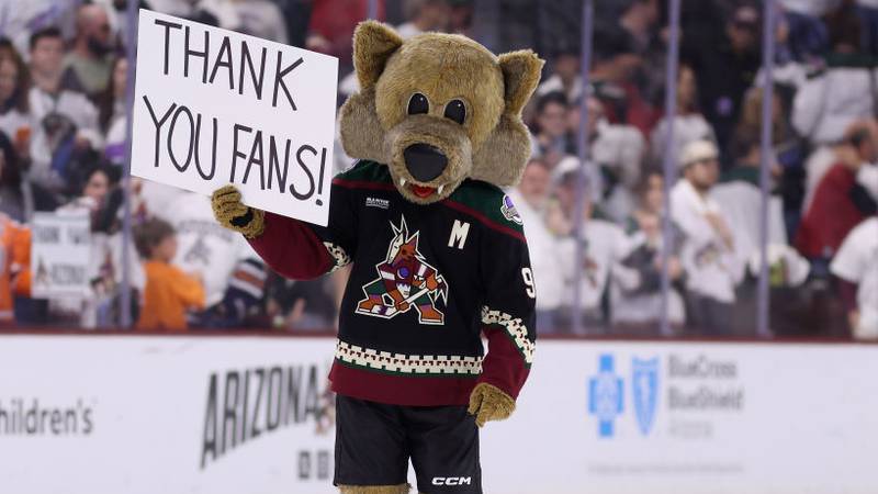 TEMPE, ARIZONA - APRIL 17: The Arizona Coyotes mascot, "Howler" holds up a sign reading "thank you fans" following the NHL game against the Edmonton Oilers at Mullett Arena on April 17, 2024 in Tempe, Arizona. Tonight's game likely marks the end of 28 years for the franchise, playing in the NHL's smallest arena, with an anticipated move to Utah with the team's expected sale to the NBA's Utah Jazz owner Ryan Smith. (Photo by Christian Petersen/Getty Images)