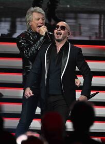 Pitbull & Jon Bon Jovi rocked the stage, performing "We Do It Our Way" At The 2024 Latin GRAMMYs! (Courtesy of Larry Marano)