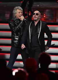 Pitbull & Jon Bon Jovi rocked the stage, performing "We Do It Our Way" At The 2024 Latin GRAMMYs! (Courtesy of Larry Marano)