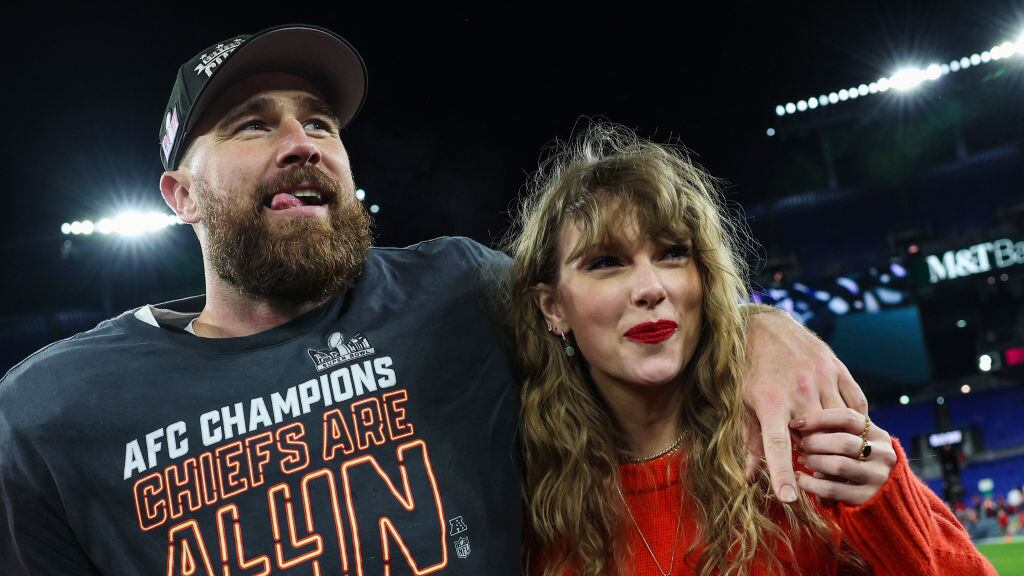 BALTIMORE, MARYLAND - JANUARY 28: Travis Kelce #87 of the Kansas City Chiefs (L) celebrates with Taylor Swift after defeating the Baltimore Ravens in the AFC Championship Game at M&T Bank Stadium on January 28, 2024 in Baltimore, Maryland. (Photo by Patrick Smith/Getty Images)