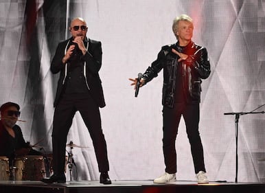 Pitbull & Jon Bon Jovi rocked the stage, performing "We Do It Our Way" At The 2024 Latin GRAMMYs! (Courtesy of Larry Marano)