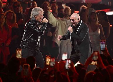 Pitbull & Jon Bon Jovi rocked the stage, performing "We Do It Our Way" At The 2024 Latin GRAMMYs! (Courtesy of Larry Marano)