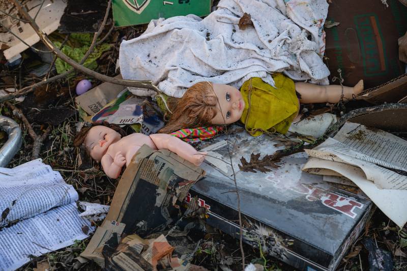 MADISON, TENNESSEE - DECEMBER 10: Dolls and other belongings are strewn about in a yard in the aftermath of a tornado on December 10, 2023 in Madison, Tennessee. Multiple long-track tornadoes were reported in northwest Tennessee on December 9th causing multiple deaths and injuries and widespread damage. (Photo by Jon Cherry/Getty Images)